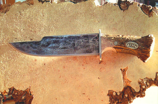 Damascus 4.5 inch blade  with carved ivory handle