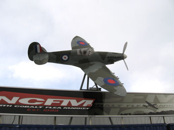 Half-sized Spitfire fighter plane in place